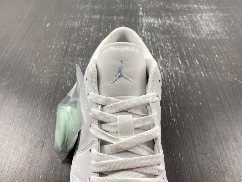 Air Jordan 1 Low Sliver Swoosh FQ9112-100